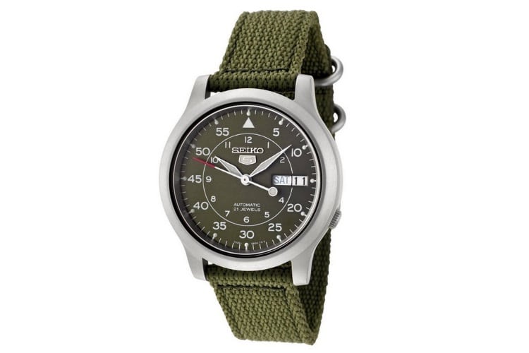 This military inspired watch features a green dial nestled in a ...
