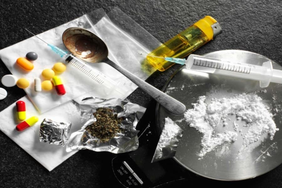 Drugs, spoon and lighter