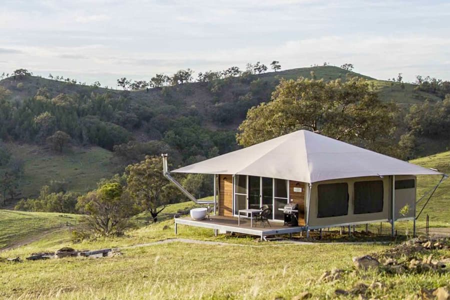 Tent with mountains in background