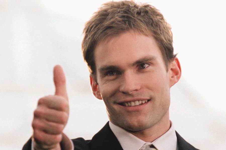 A man showing a thumbs up