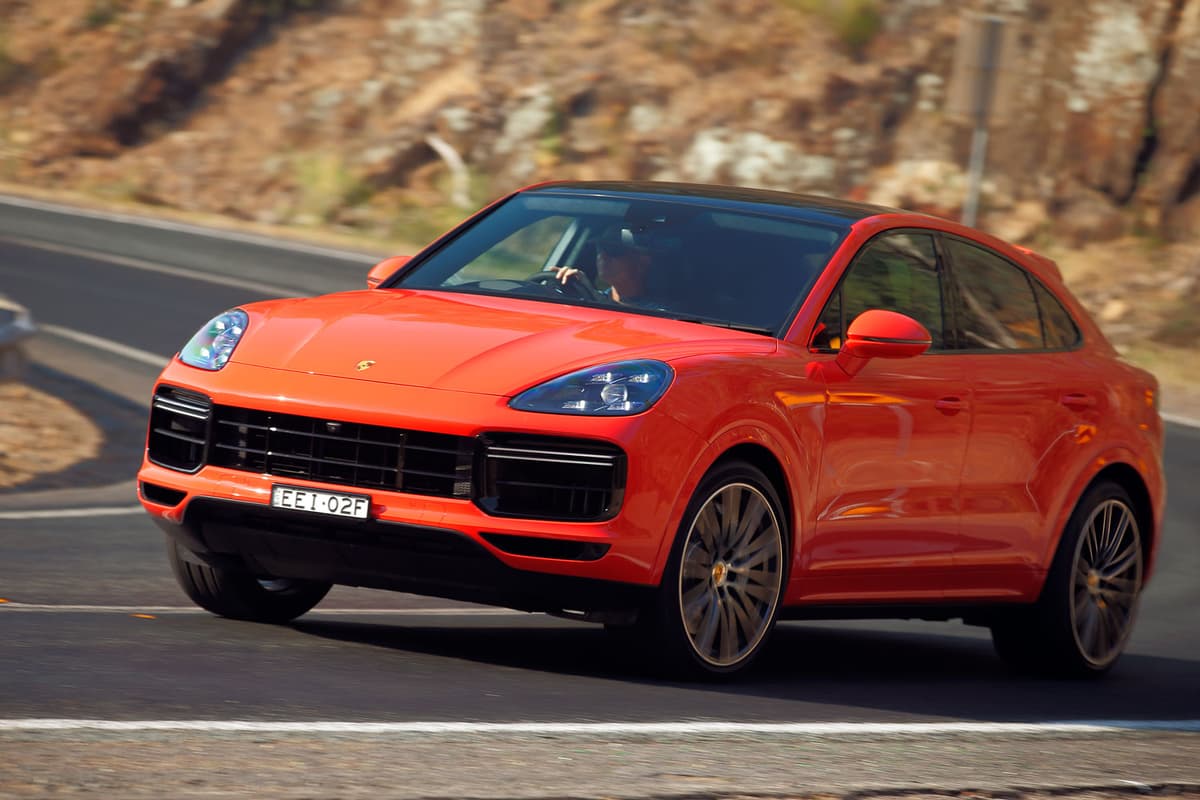 Orange 2020 Porsche Cayenne Coupé on road