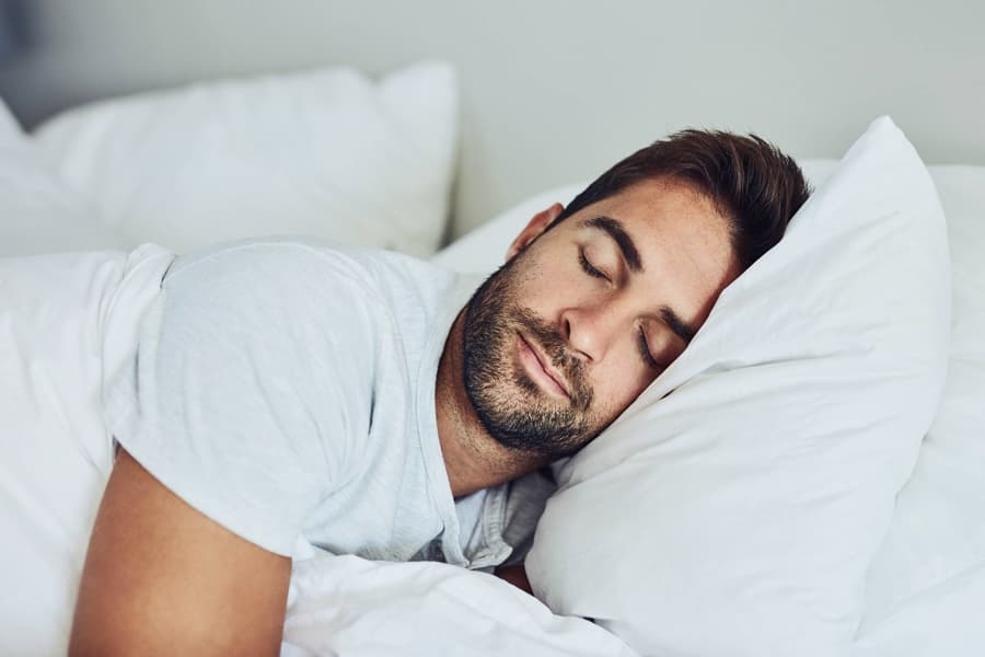 A man sleeping on his side