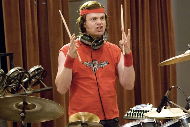 Rainn Wilson as  a drummer from Whiplash