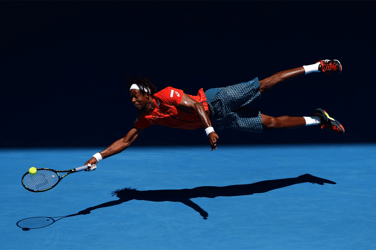 Gael Monfils dives at Australian Open 2016