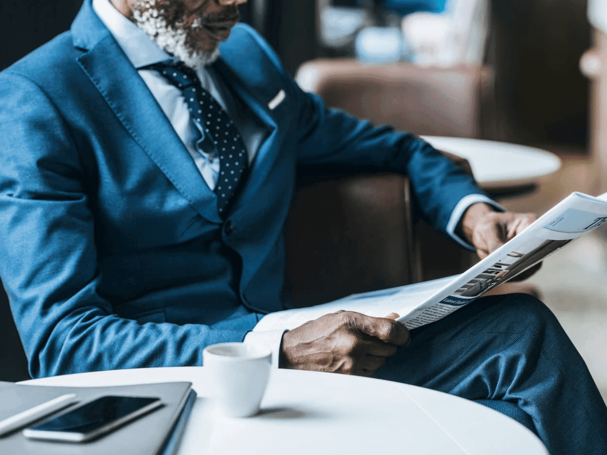 Gentleman reading newspaper