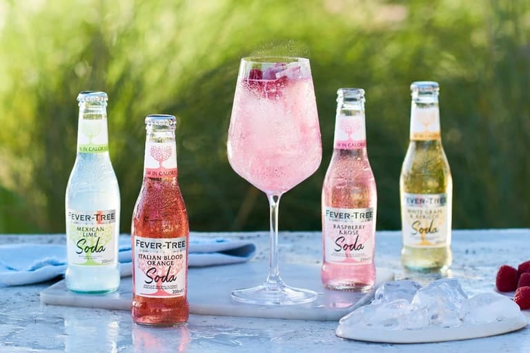 Bottles of gin and tonic on a table