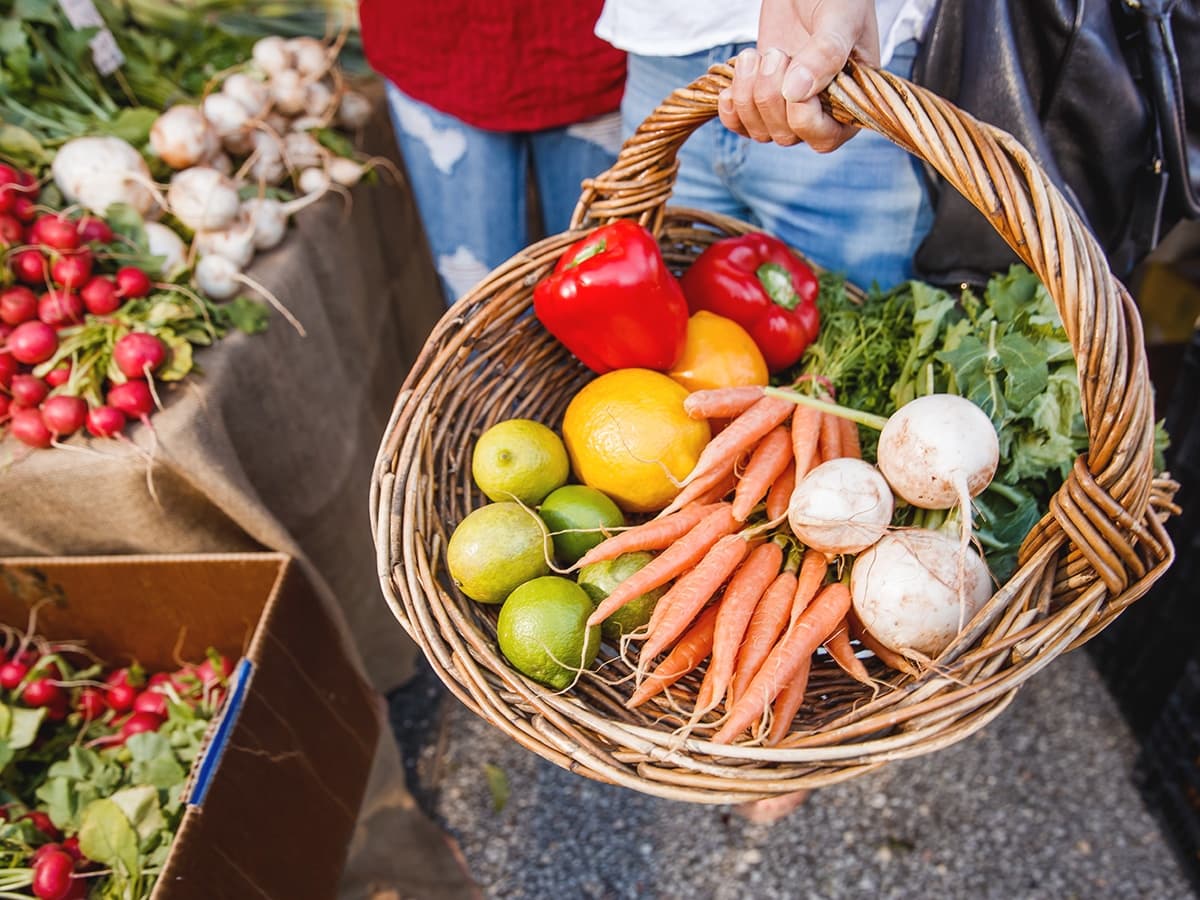 fresh vegetables in basket at jan powers farmers markets