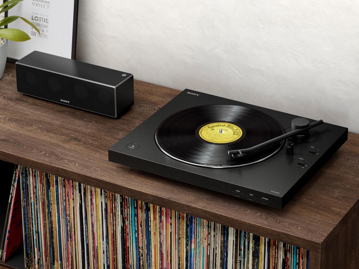 record player on a book shelf