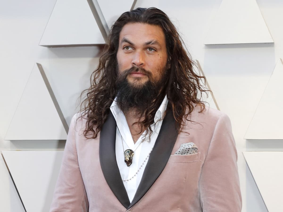 Jason Momoa in light purple suit