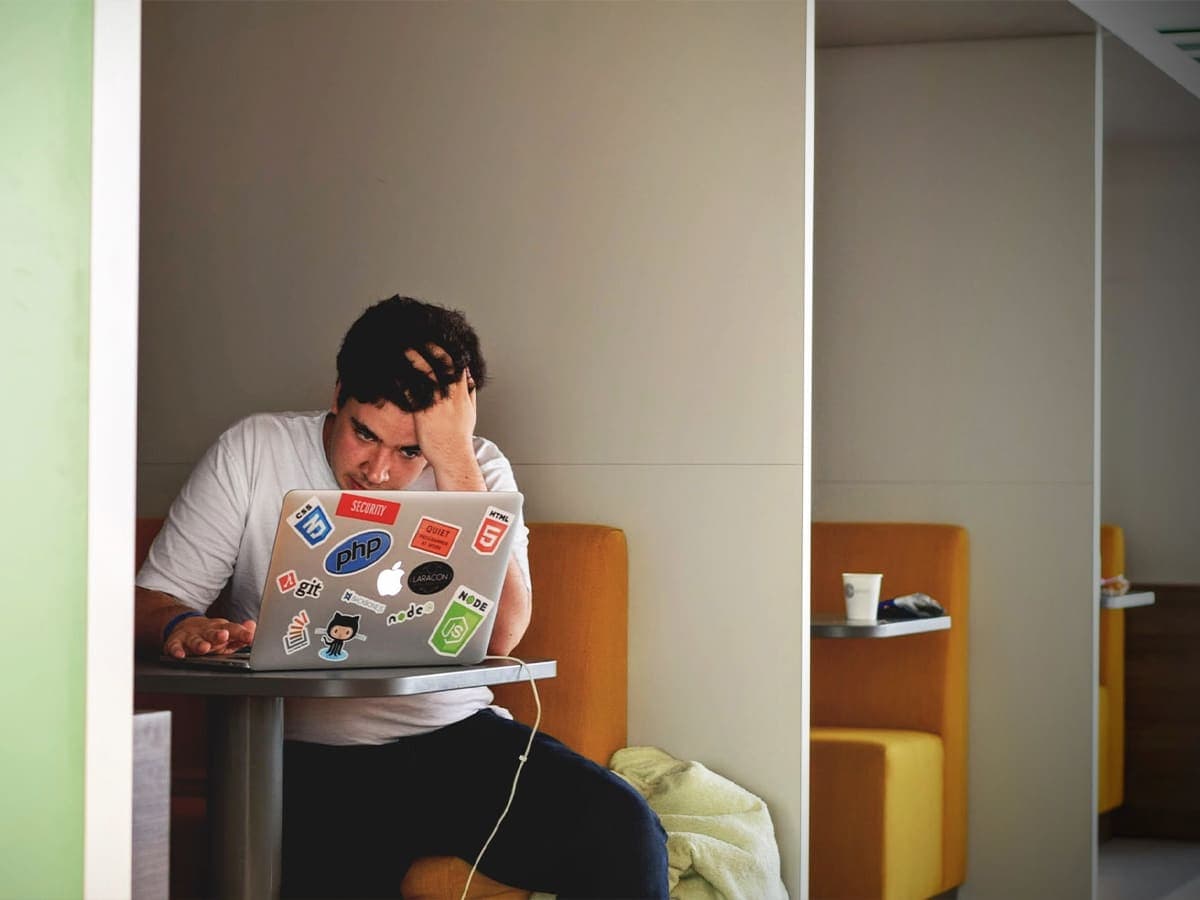 Stressed man at work | Image: Tim Gouw/Unsplash