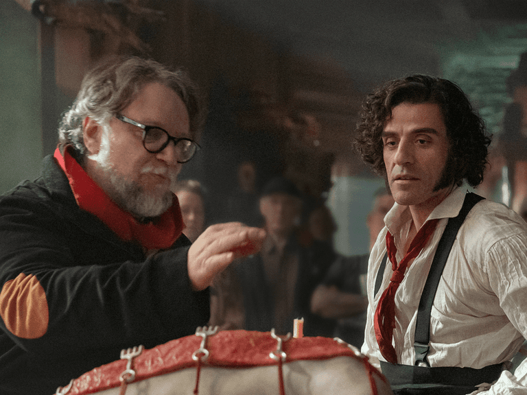 Guillermo del Toro and Oscar Issac in 'Frankenstein' (2025)