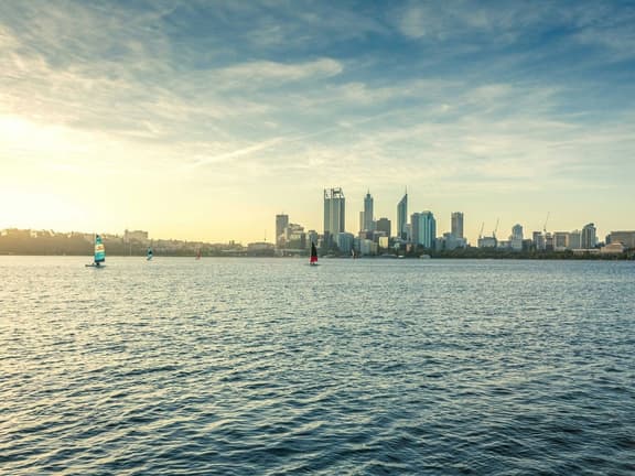 Perth city skyline across the Swan River on a clear day