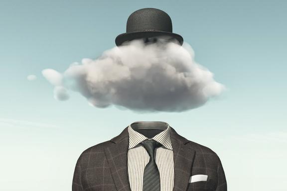 A suit with a cloud in place of a person's head and a hat above cloud