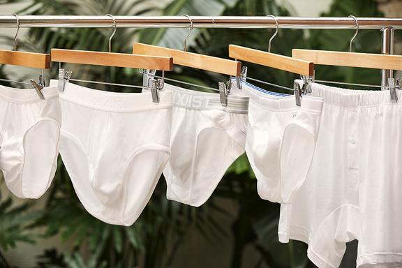 White underwears drying on laundry strings