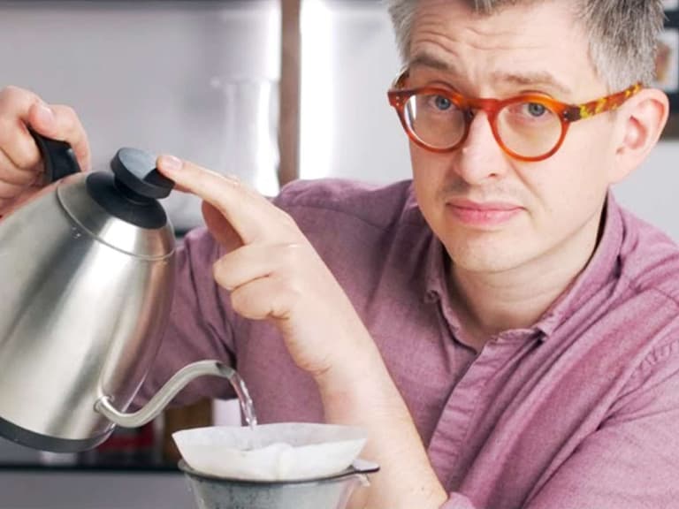 James Hoffman ouring hot water on a coffee filter