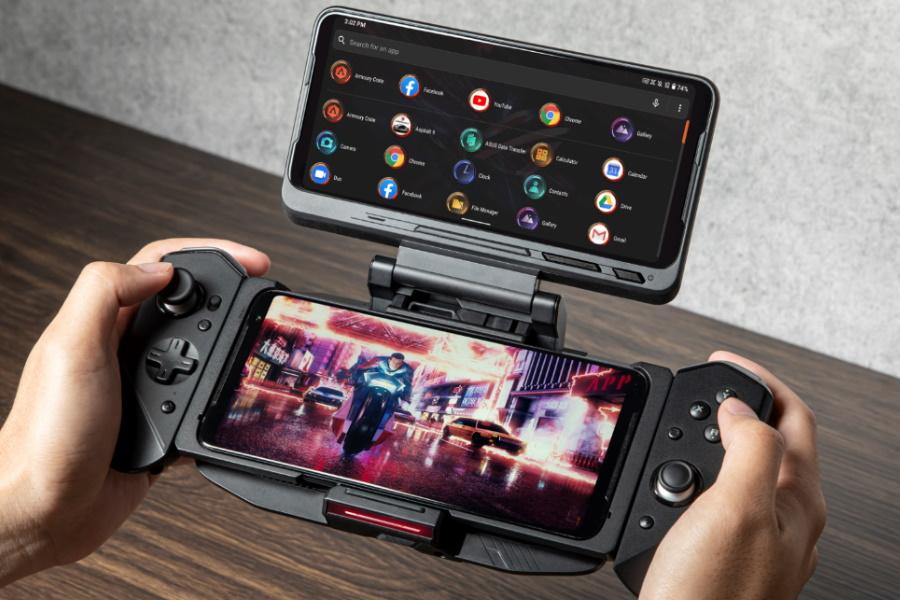 A pair of hands holding ASUS ROG 3 Gaming Phone