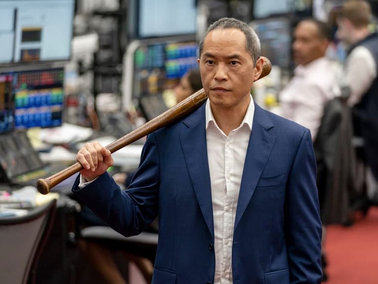 Ken Leung with a baseball bat from HBO's Industry