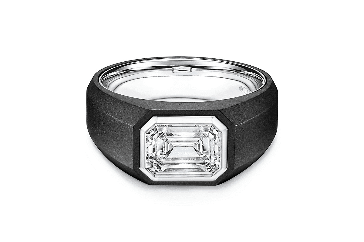 Black titanium with an emerald cut diamond