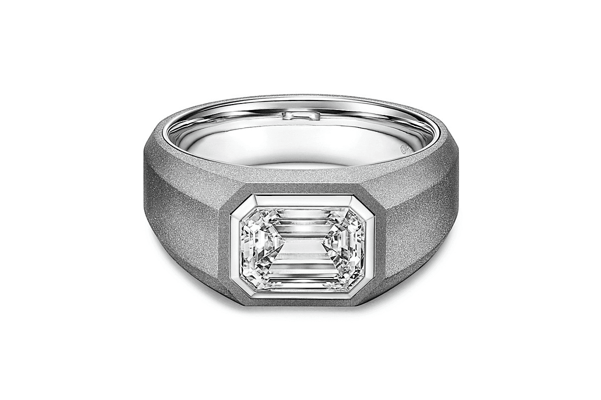 Gray titanium with an emerald cut diamond