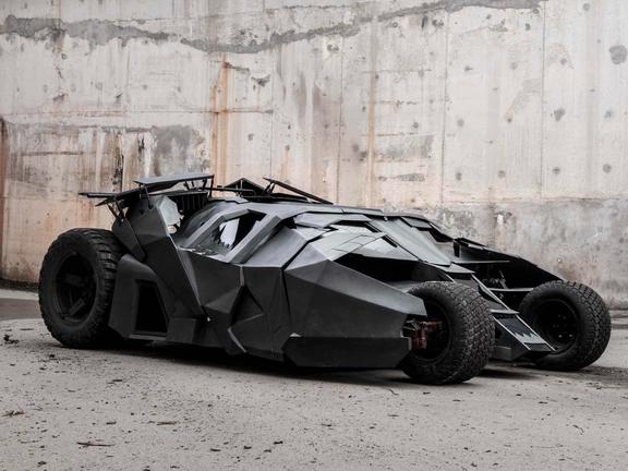 Electric replica of tank-like Batmobile on the road side view