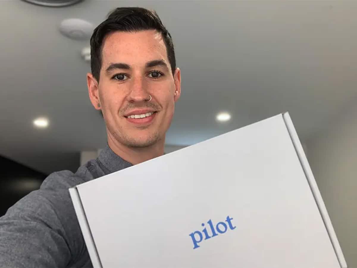 Nick Hall with Pilot package in hand