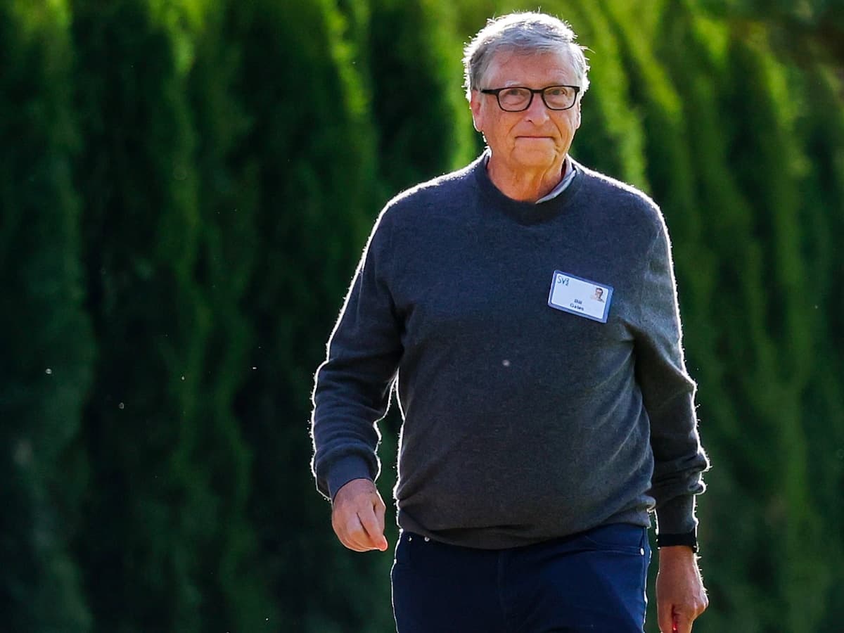 Bill gates wearing a name tag during the allen co conference in 2022