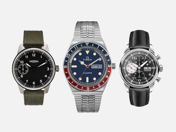 Three different watches with grey background