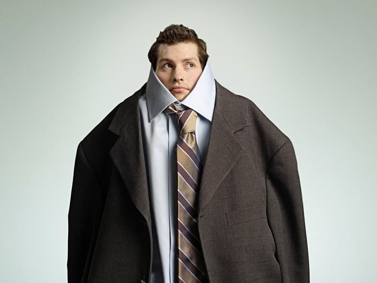 Man wearing oversized suit