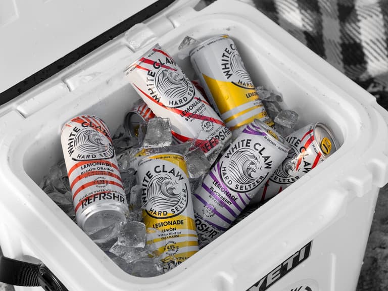 White claw refrshr hard lemonade feature hands