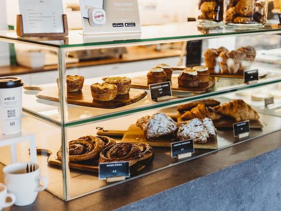 Cafe pastry display at East Row Speciality Coffee