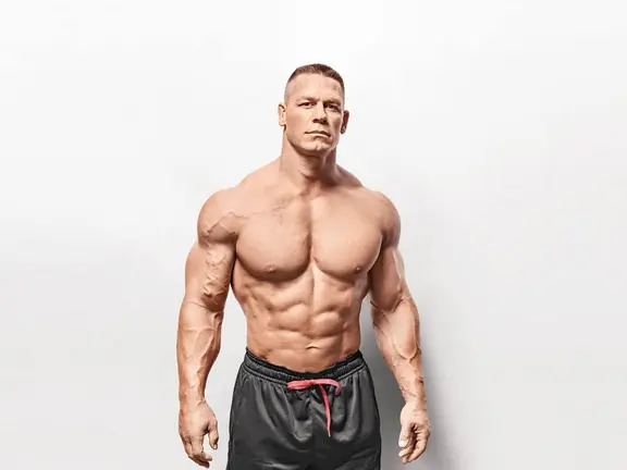 John Cena's height is around 6'1" | Image: Muscle & Fitness