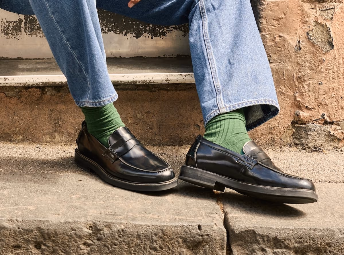bared footwear loafer with jeans and green socks