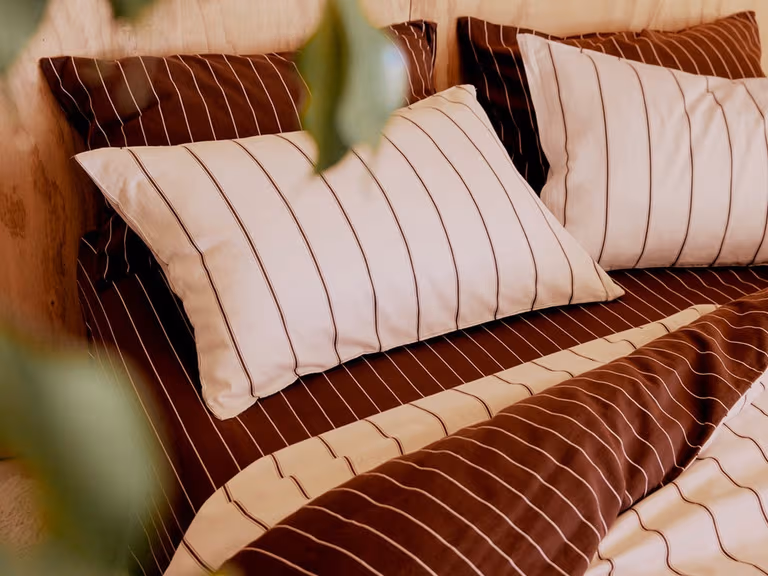 Bonny All Rounder Quilt styled on a bed