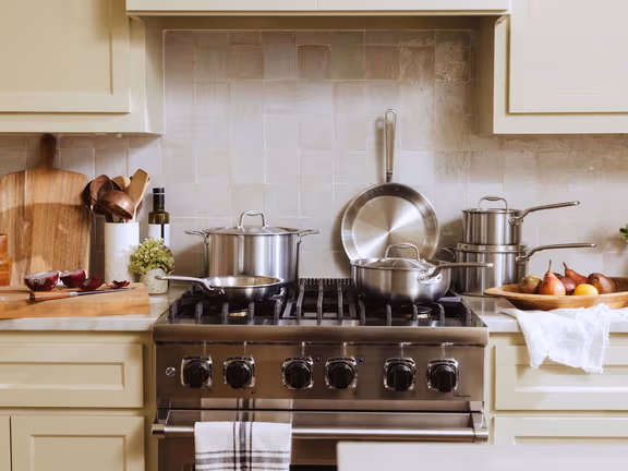 Made In Cookware stainless clad pots and pans on a home kitchen stovetop