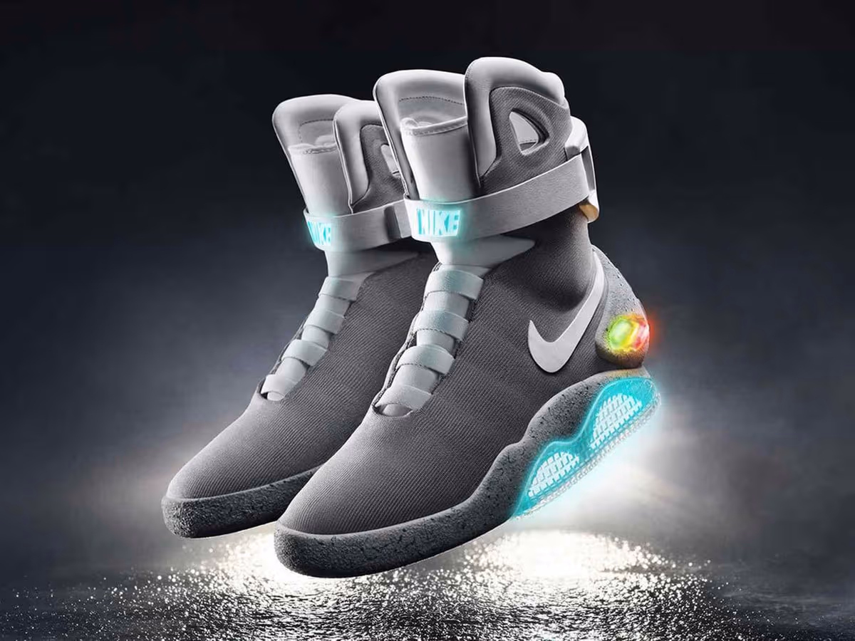 A pair of 2011 Nike MAG Back to the Future replica shoes with illuminated straps and glowing outsoles