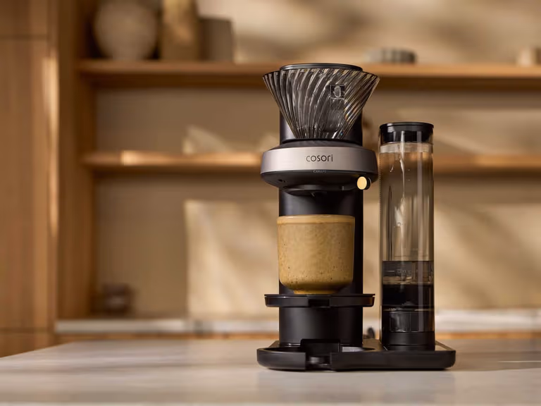 The Cosori JUNI automatic pour-over coffee machine on a kitchen counter
