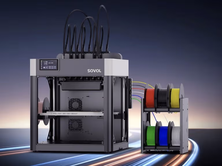 The Sovol M1D 3D printer, with filament tubes feeding its row of toolhead docks, beside a two-tier rack of colour filament spools