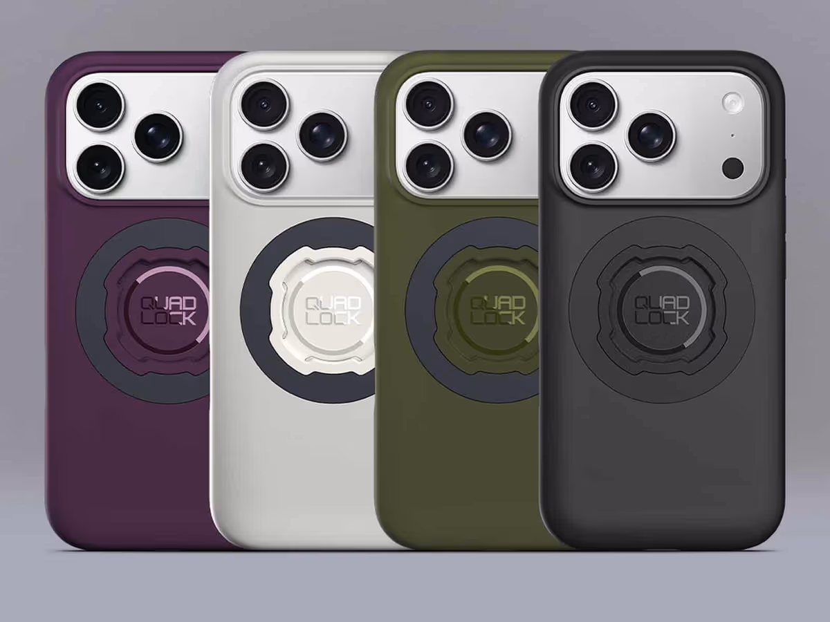 Four Quad Lock iPhone 18 cases in Plum, Stone, Olive and Black lined up side by side on a grey studio background