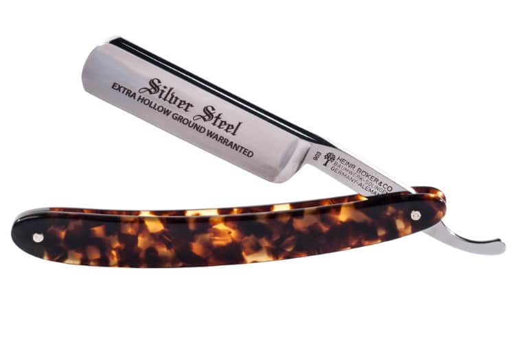 silver steel straight razor