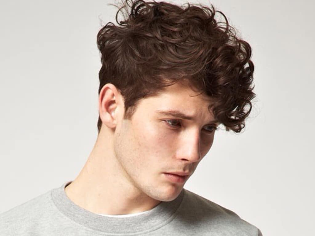 5. "The Best Curly Hairstyles for Men with Blonde Hair" by Men's Health - wide 9