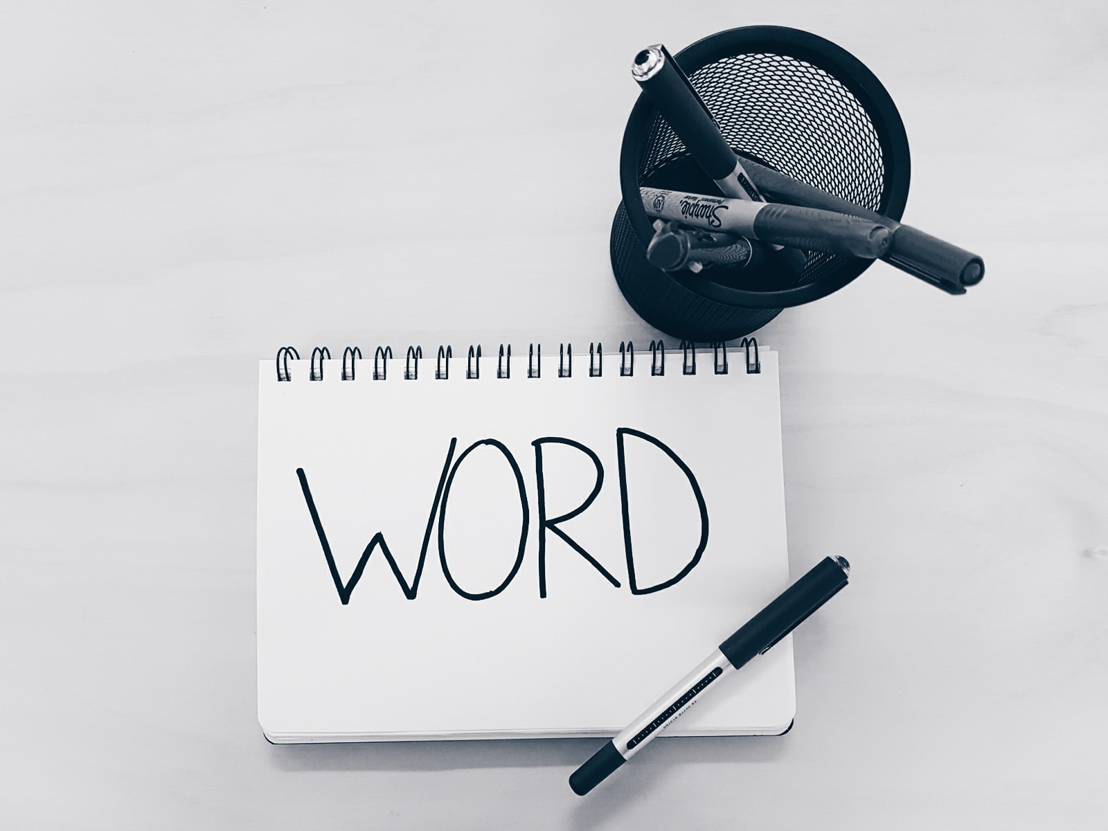 handwriting of word with pen