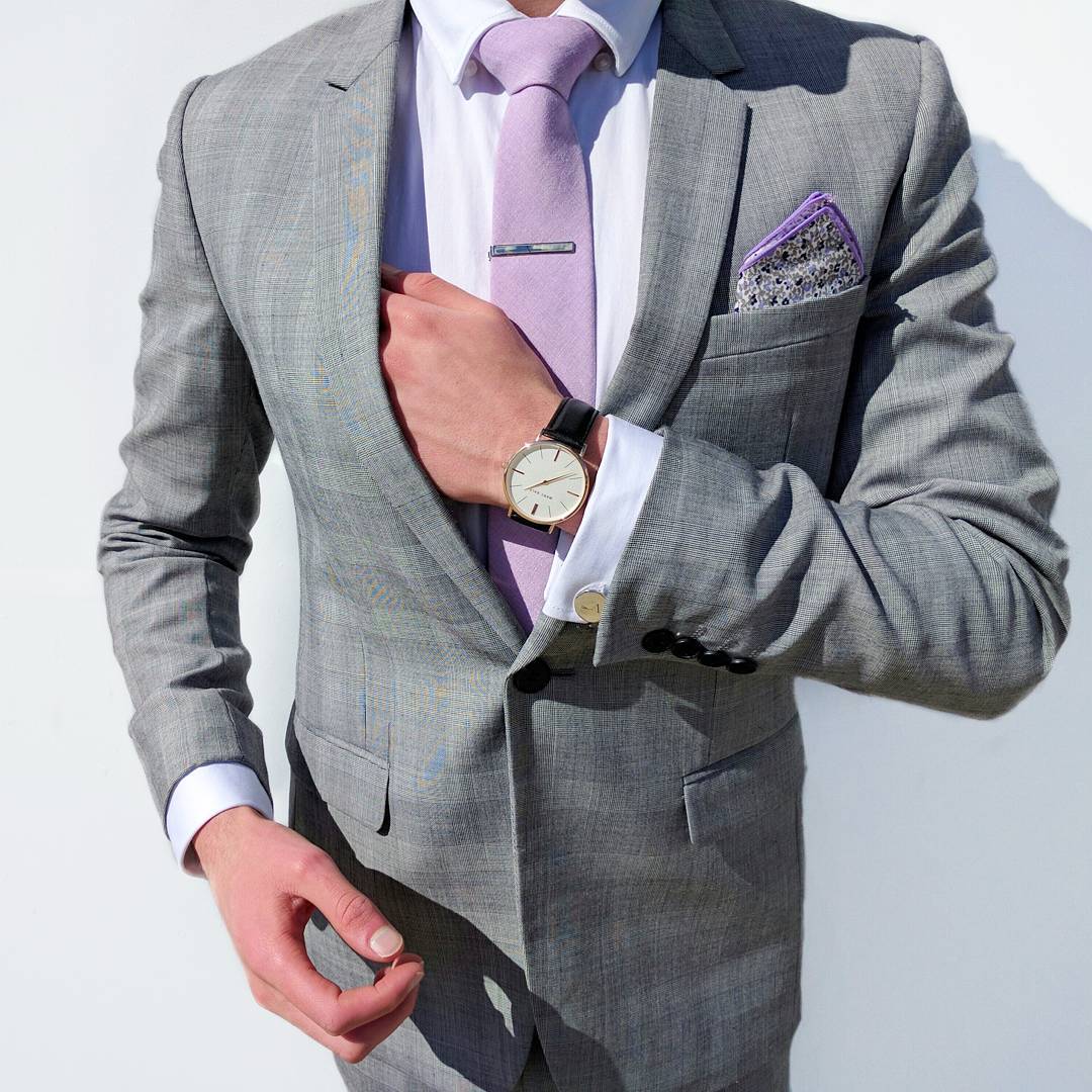 wearing white shirt tie and pocket square