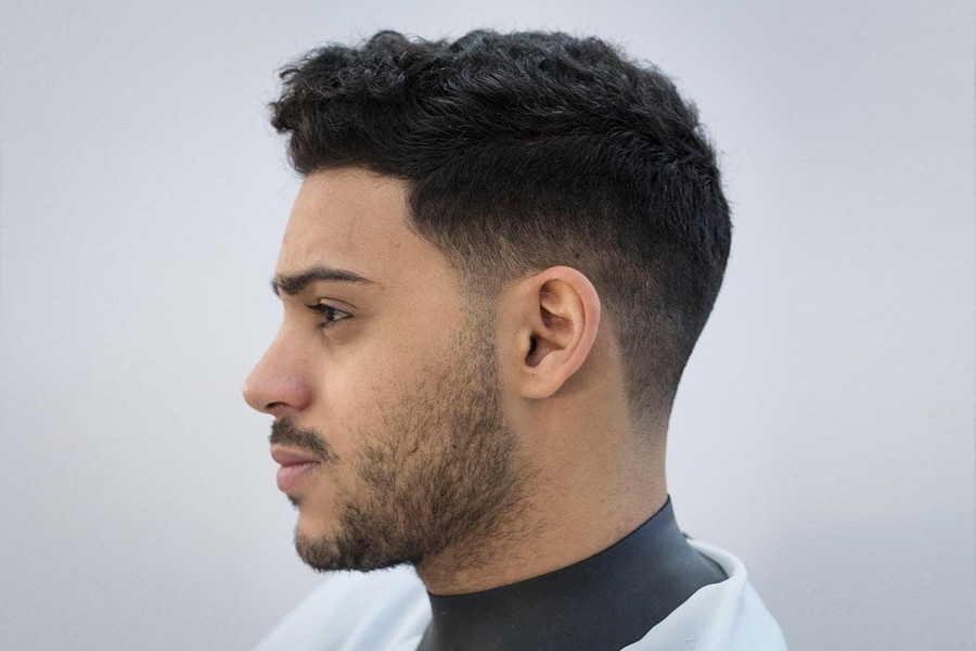Man with curly short haircut hairstyle