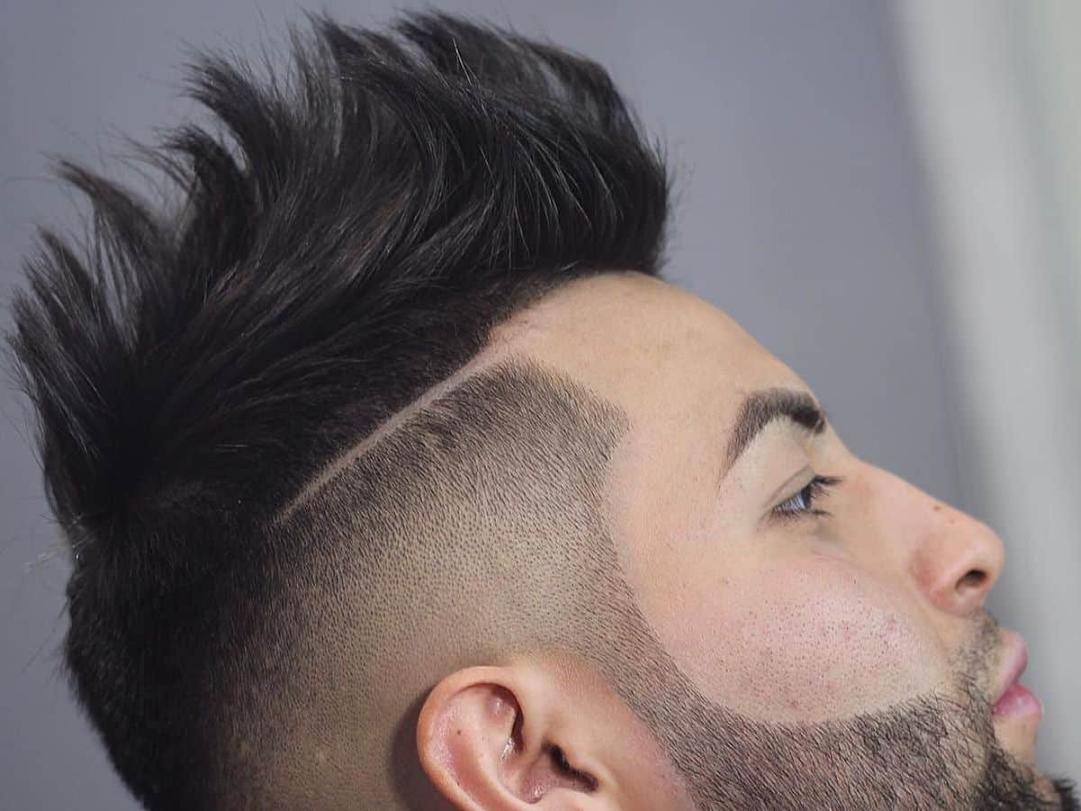 Side of a man's head with High Top Spiked Faux Hawk hairstyle