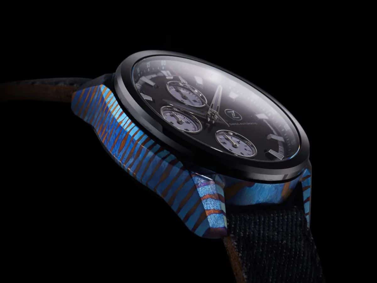 Closeup of Zelos ZX_series watch with copper tiger-stripes over blue case