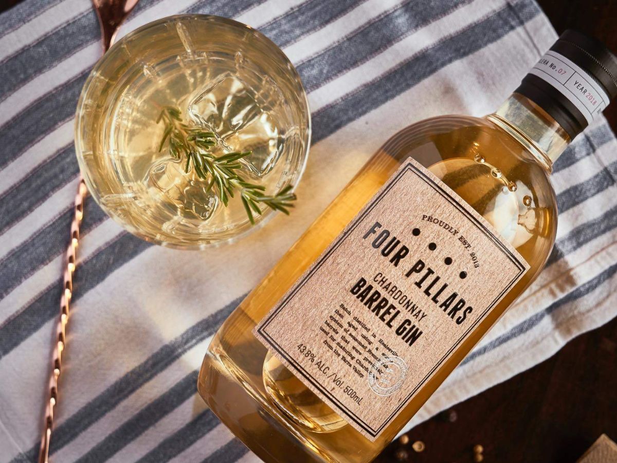Four Pillars new Sherry Cask Gin plus spoon and cocktail glass