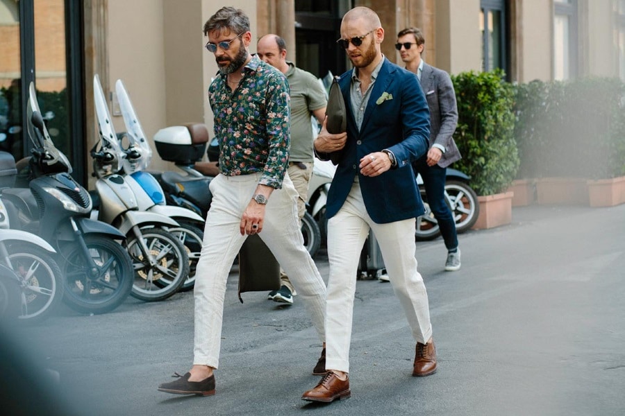 men sporting white business casual pants