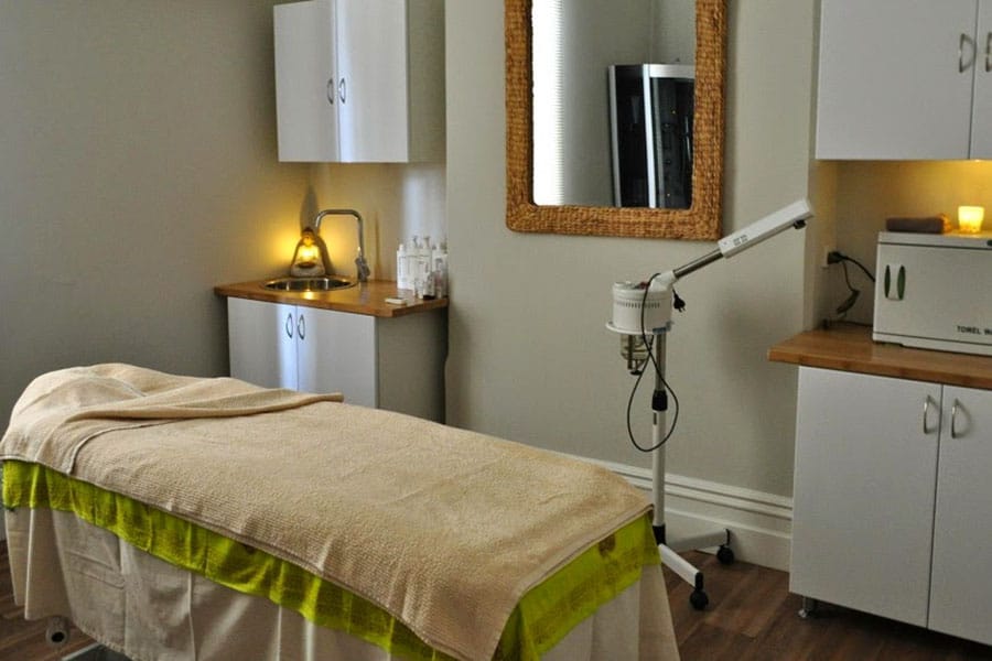 massage room with bed 