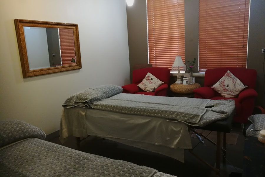 massage room with massage bed