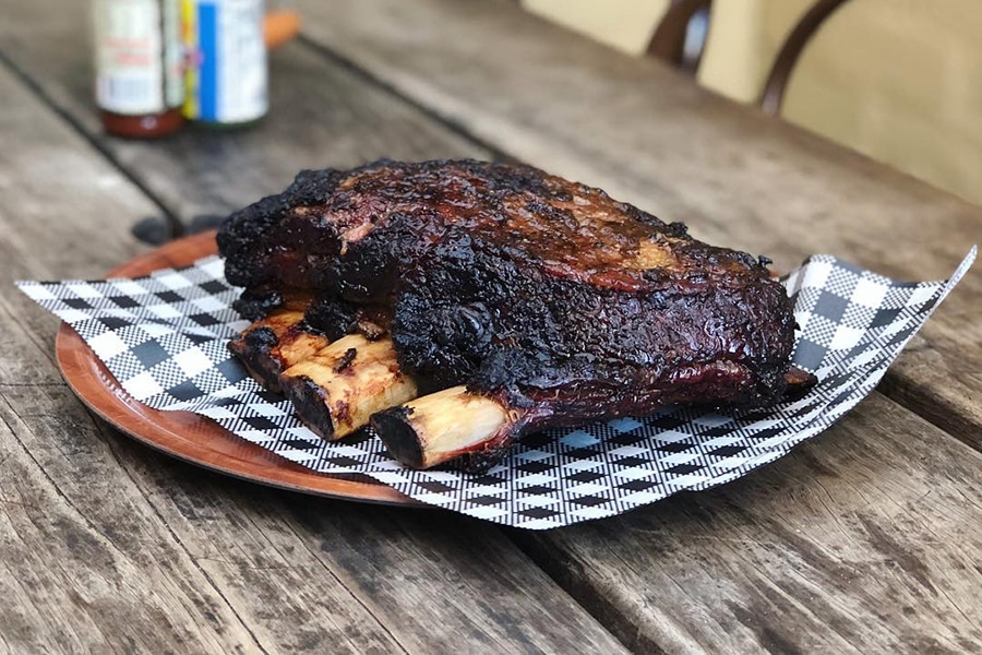 short ribs on wooden table 
